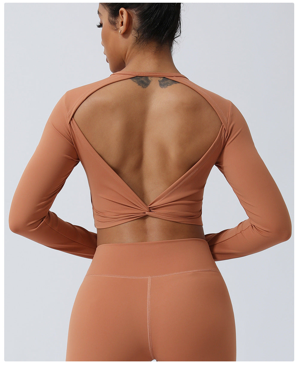 Spring New nude hollow-out beauty back sports top twisted short yoga clothes with chest pad long sleeve T-shirt workout clothes