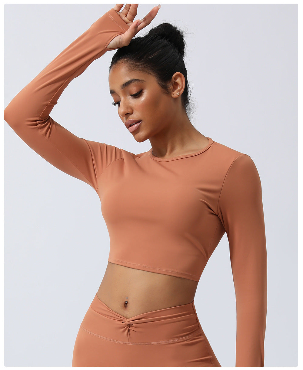 Spring New nude hollow-out beauty back sports top twisted short yoga clothes with chest pad long sleeve T-shirt workout clothes