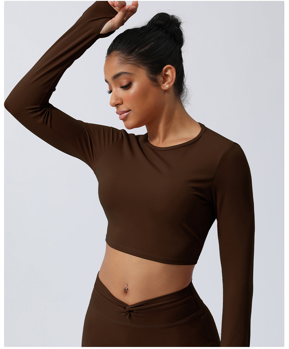 Spring New nude hollow-out beauty back sports top twisted short yoga clothes with chest pad long sleeve T-shirt workout clothes