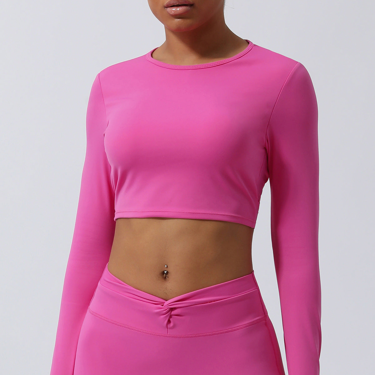 Spring New nude hollow-out beauty back sports top twisted short yoga clothes with chest pad long sleeve T-shirt workout clothes