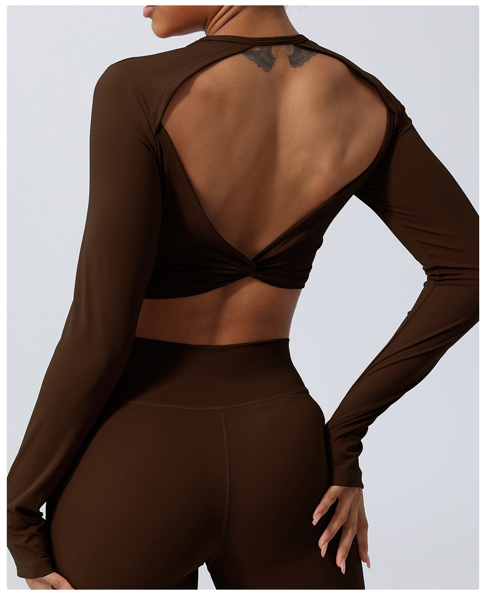 Spring New nude hollow-out beauty back sports top twisted short yoga clothes with chest pad long sleeve T-shirt workout clothes
